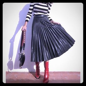 Faux leather pleated skirt.